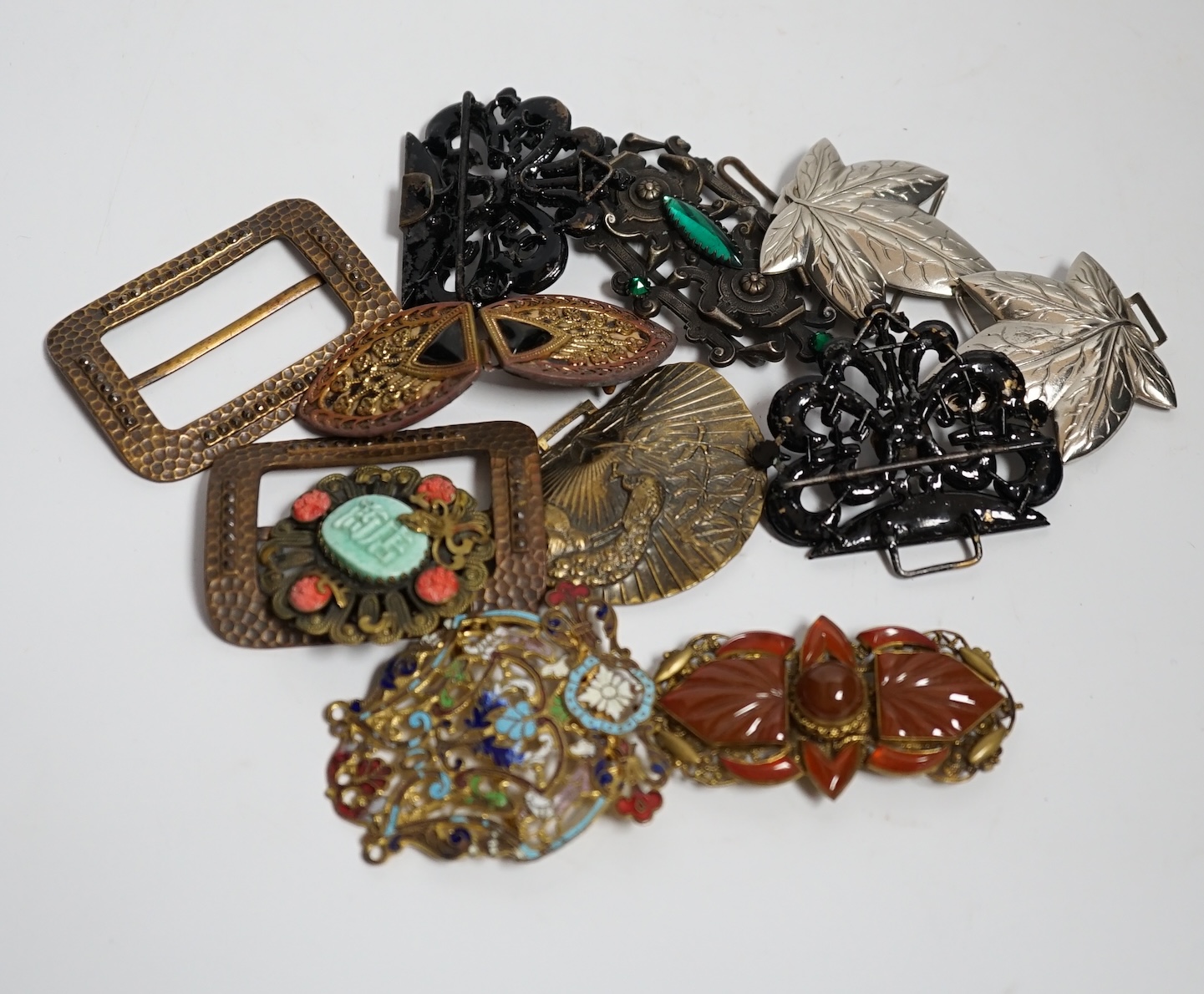A collection of 20th century and later buckles including jet, Art Deco paste, Japanese Satsuma and two gilt metal and enamel examples